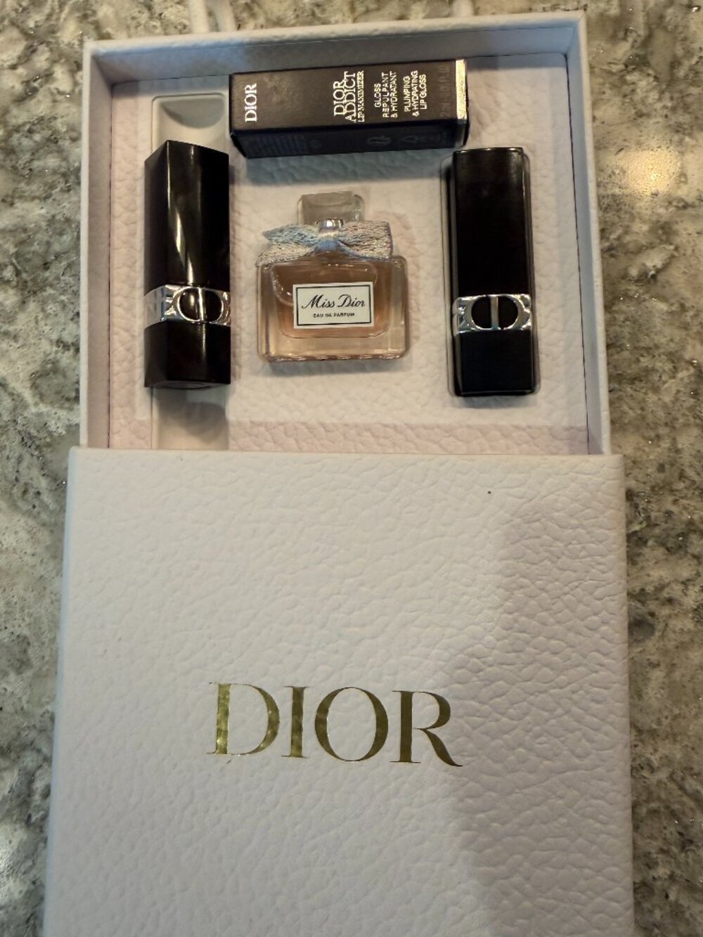 Dior : 2 beautiful Rouge lip sticks, 1 Lip Maximizer, 1 Miss Dior Perfume